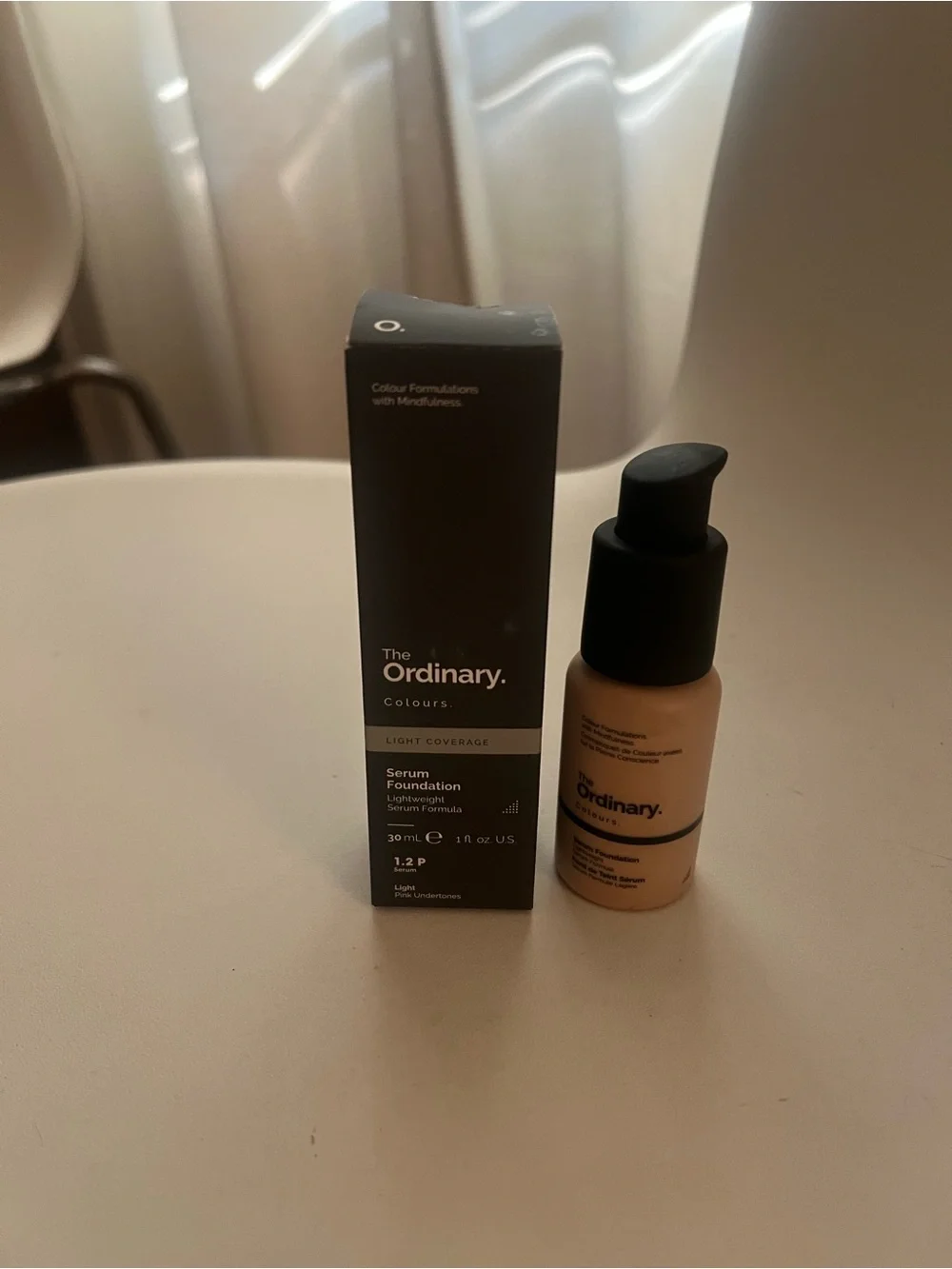 The Ordinary Serum Foundation in Light Pink Undertones with Black Pump